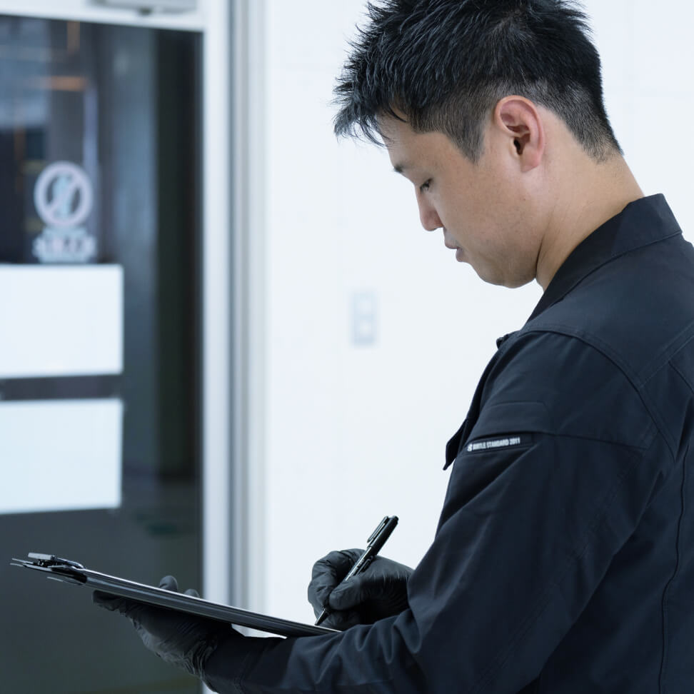 調査中の代表穂苅